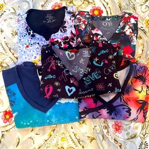 Lot of 5 cute scrub tops in xs and xxs. Lightly worn great condition